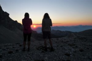 Pozorování východu slunce u Domu Planika pod Triglavem
